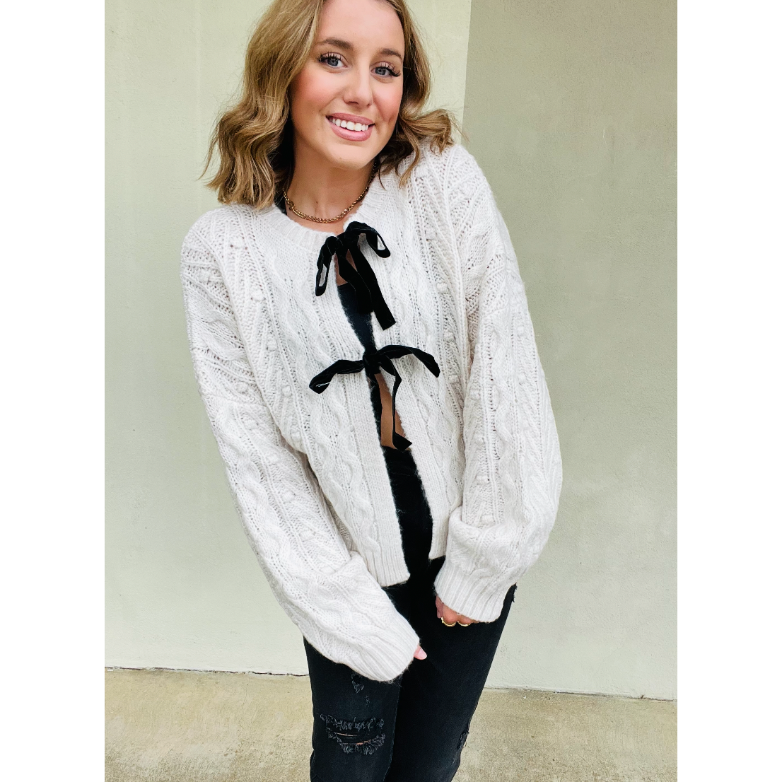 Velvet Bow Elegance Cable Knit Cardigan